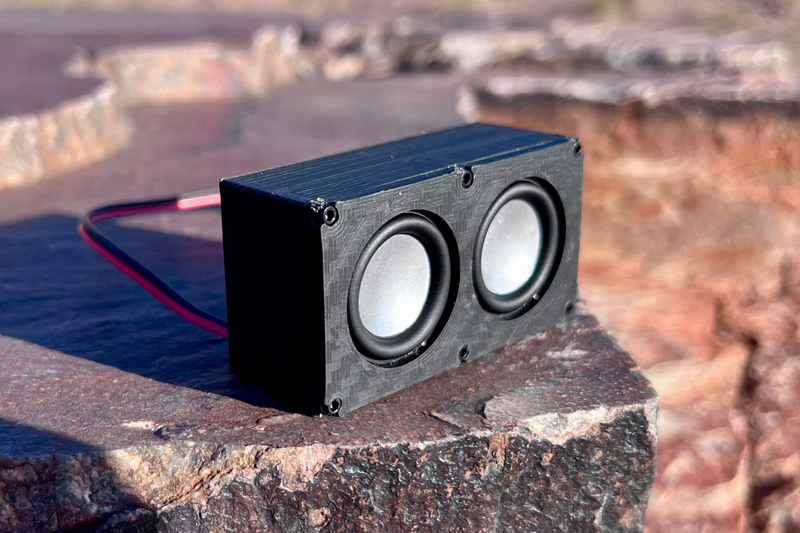The Micro Double at a three-quarter angle showing the depth of the box and both drivers. 1/24 and 1/18 scale RC speaker.