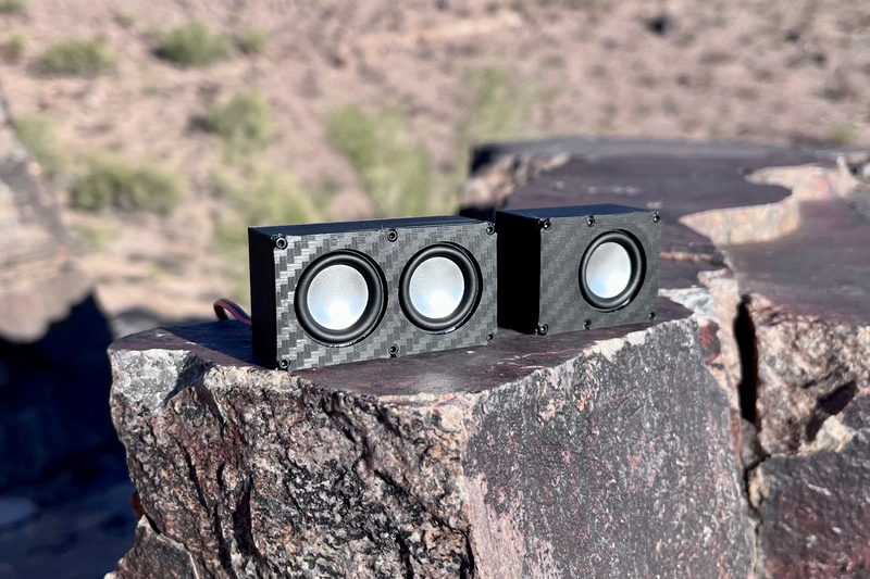 Two Micro Double units on the same rock, one showing the front face and one the side profile. 1/24 and 1/18 scale.